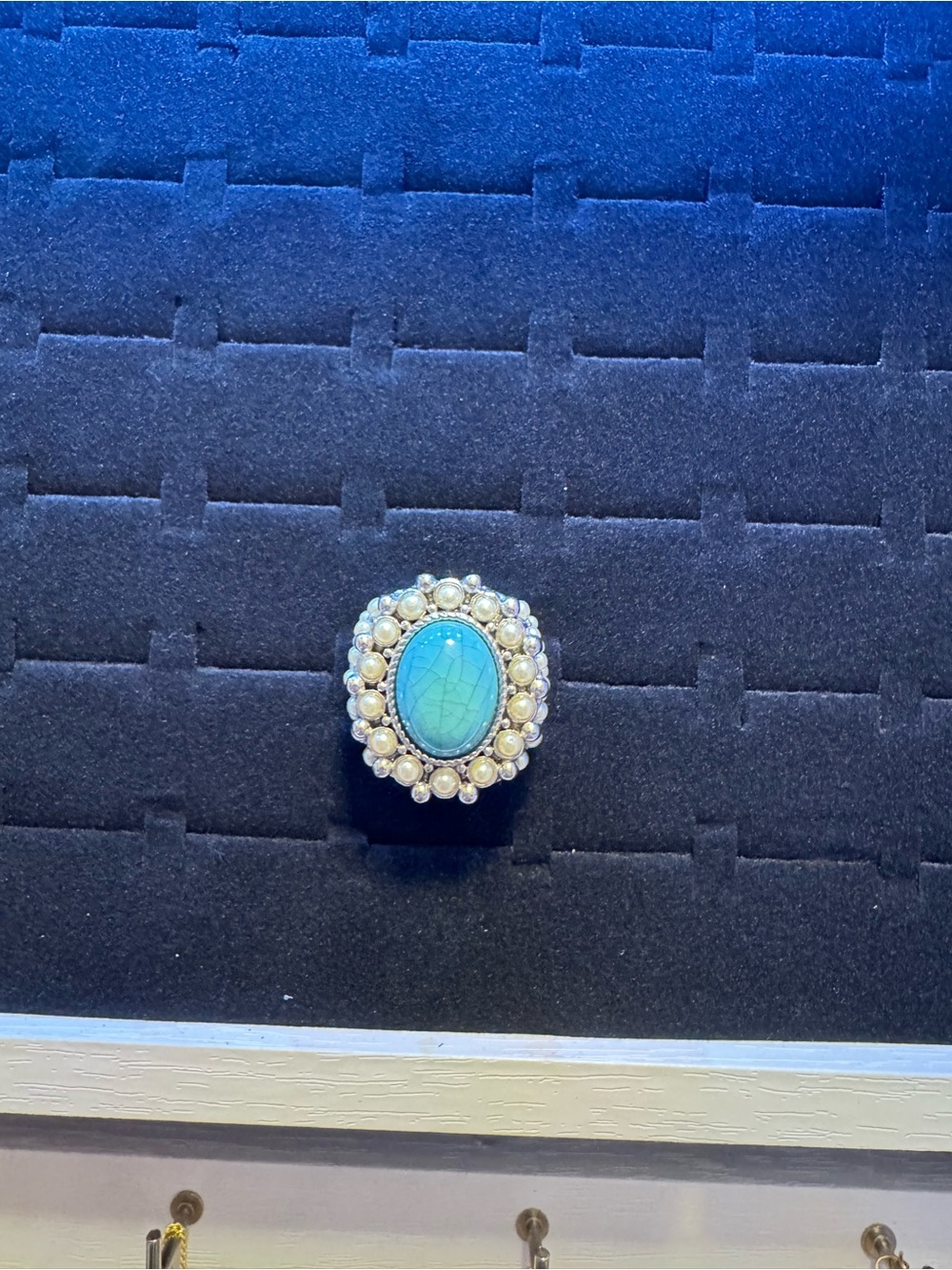 Sterling Silver Turquoise Oval Ring with Pearl Halo
